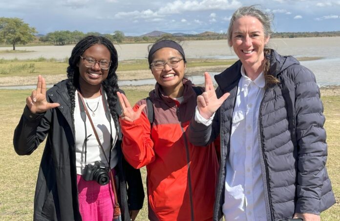Malawi photo 1 rev Two students and a professor in Northern Malawi.