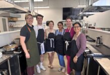 UofL’s Trager Institute culinary medicine program takes off Six people standing in a commercial kitchen