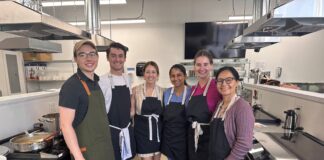 UofL’s Trager Institute culinary medicine program takes off Six people standing in a commercial kitchen
