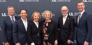 A group of UofL and business leaders at the Mary Byron Center press conference