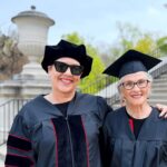 Mother and daughter cross the finish line together as UofL graduates Mother and daugther, Susan and Ramie, smile in the UofL caps and gowns on campus