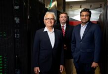 UofL’s new high-performance computing system accelerates research with AI Three men standing in front of banks of computer servers