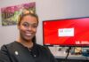 Recent dental school graduate in dental clinic office