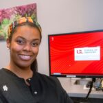 Recent dental school graduate in dental clinic office