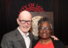 UofL President Gerry Bradley presents Diane Whitlock with the 2026 George Howe Distinguished Staff Award at the 2026 President's Excellence Awards Dinner.