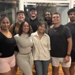 A group of college students in an indoor area