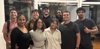 A group of college students in an indoor area