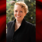 UofL selects ETSU’s Jess Vodden as new vice president for communications and marketing Woman in black jacket set within a red template frame