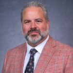 Head shot of man with beard