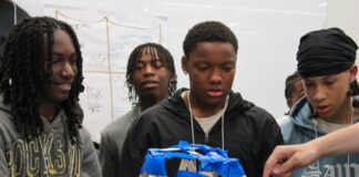 Cardinals Rising students Jeffery Durham, Aaron Bradford Jr, Malakhai Pettigrew and Jamaal Haskins participate in a building project as part of the Cardinals Rising summer camp 2026.