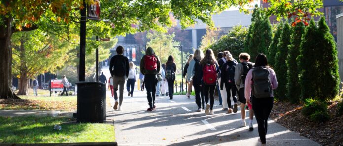 Students walking across Belknap Campus.
